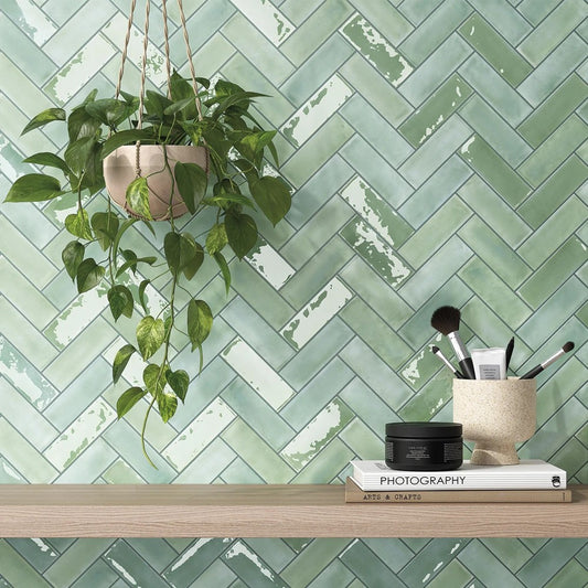 Feature wall tiled with Atelier green gloss and matt brick tiles
