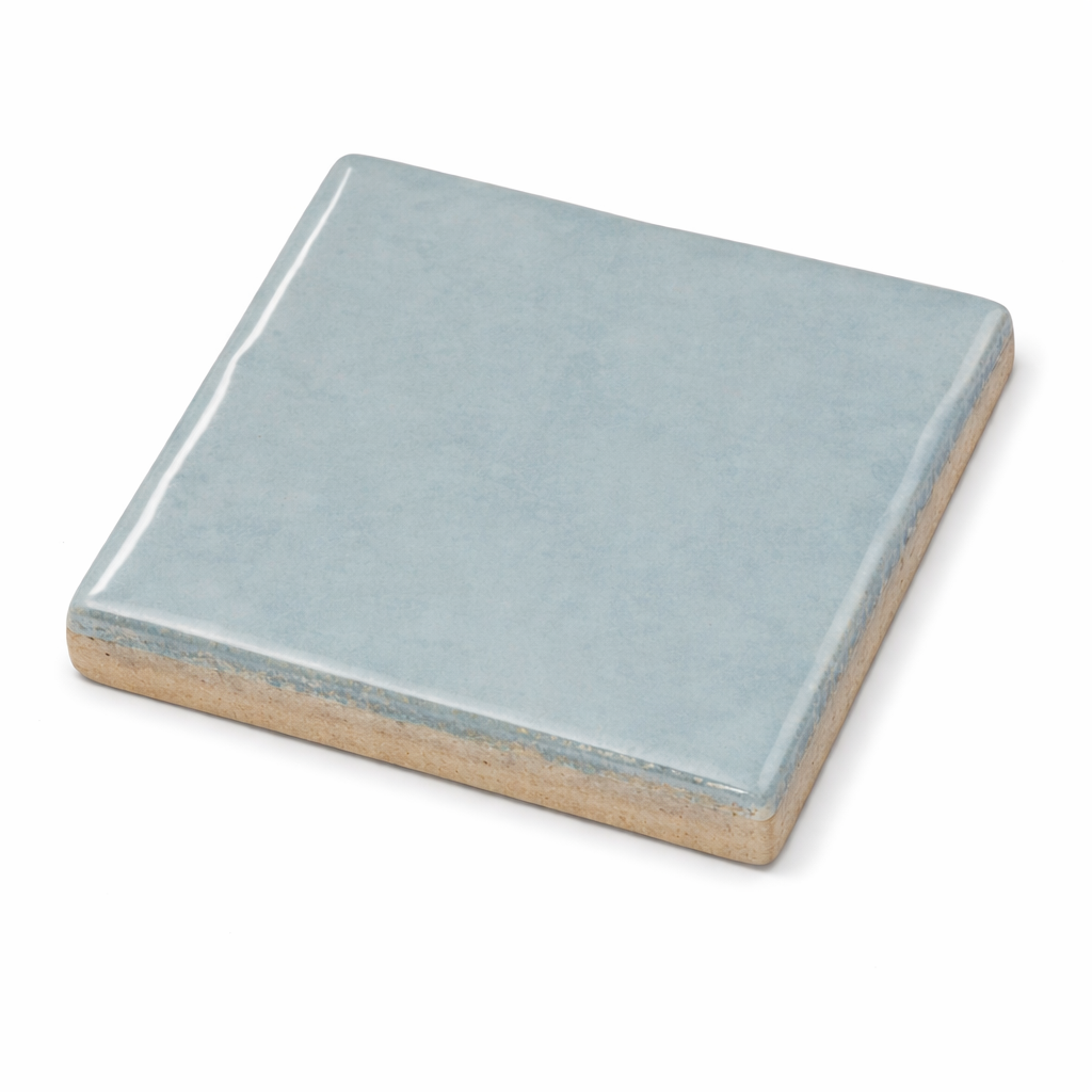 Close up of Bold blue ceramic wall tile with smooth shiny finish for modern interiors