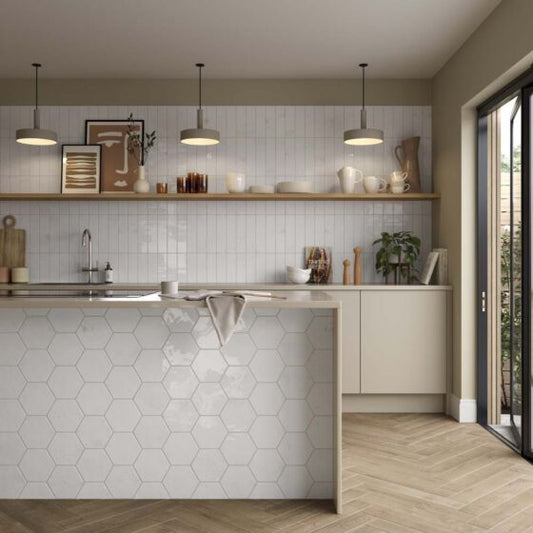 Contemporary kitchen tiled with Wish white wall tiles in a hexagon shape with glossy finish