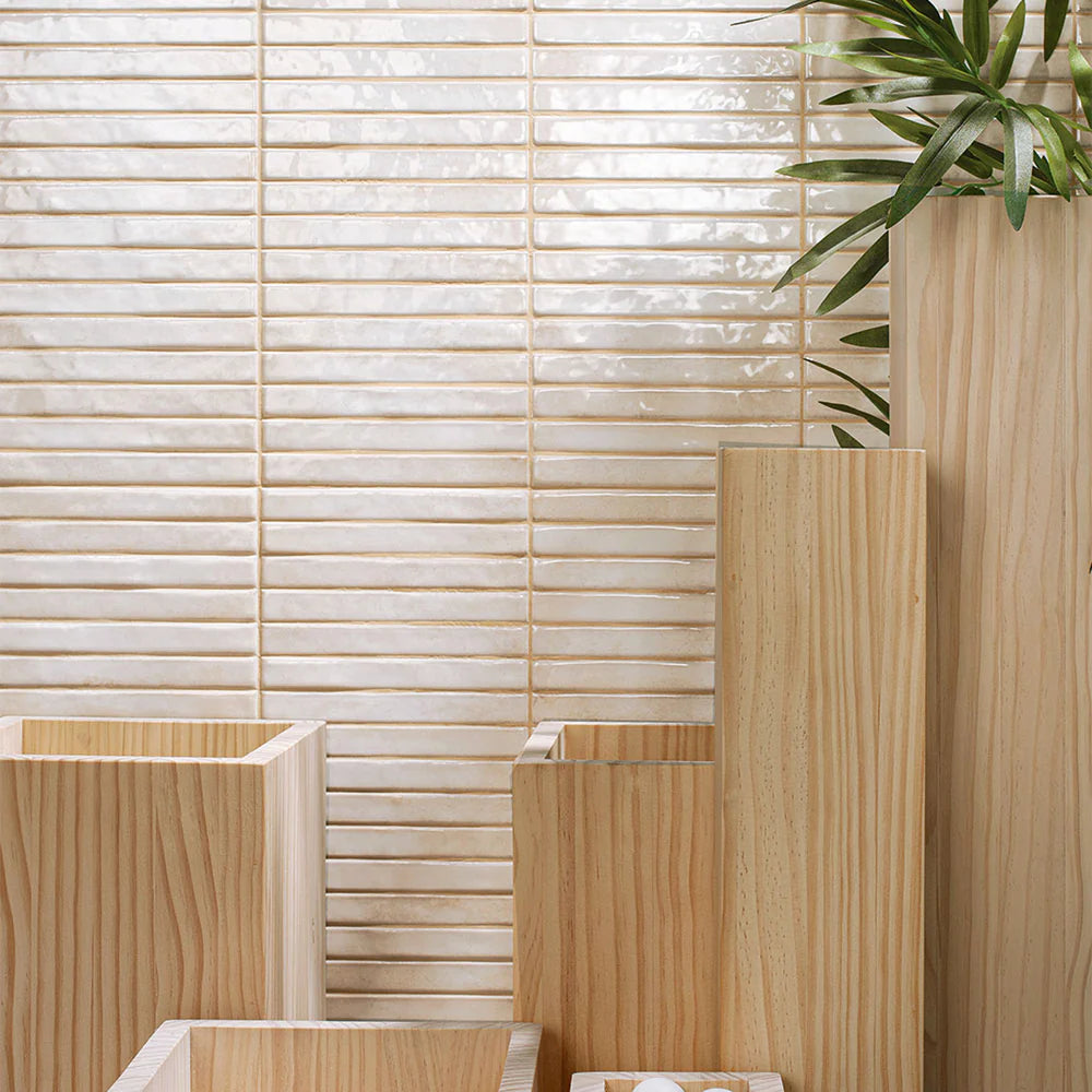 Bathroom with wooden vanity, sink, and plant