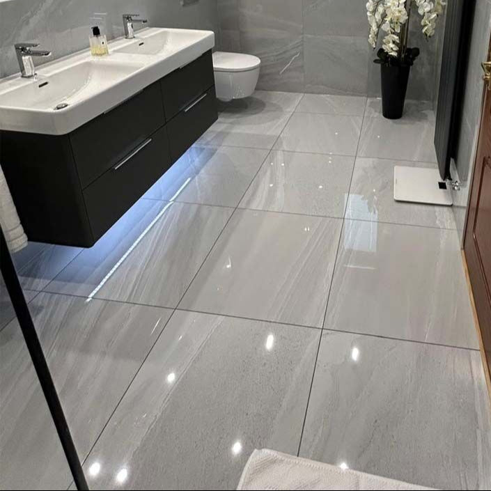 Contemporary bathroom featuring Andrea dark grey gloss porcelain floor and wall tile 