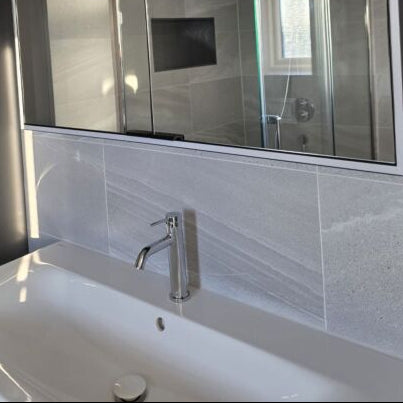 Luxury bathroom with Andrea light grey matt porcelain floor and wall tile 
