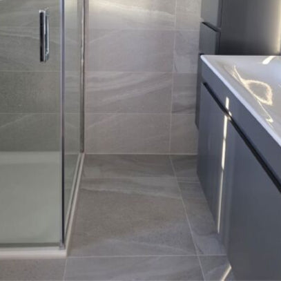 Bathroom featuring Andrea light grey matt porcelain floor and wall tile 