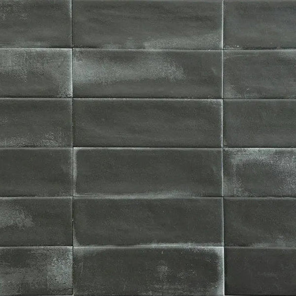 Close up of Atelier black matt tile with modern brick design for walls and floors