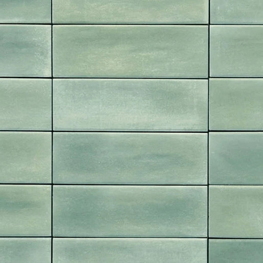 Close up of Atelier green matt tile with modern brick design for walls and floors