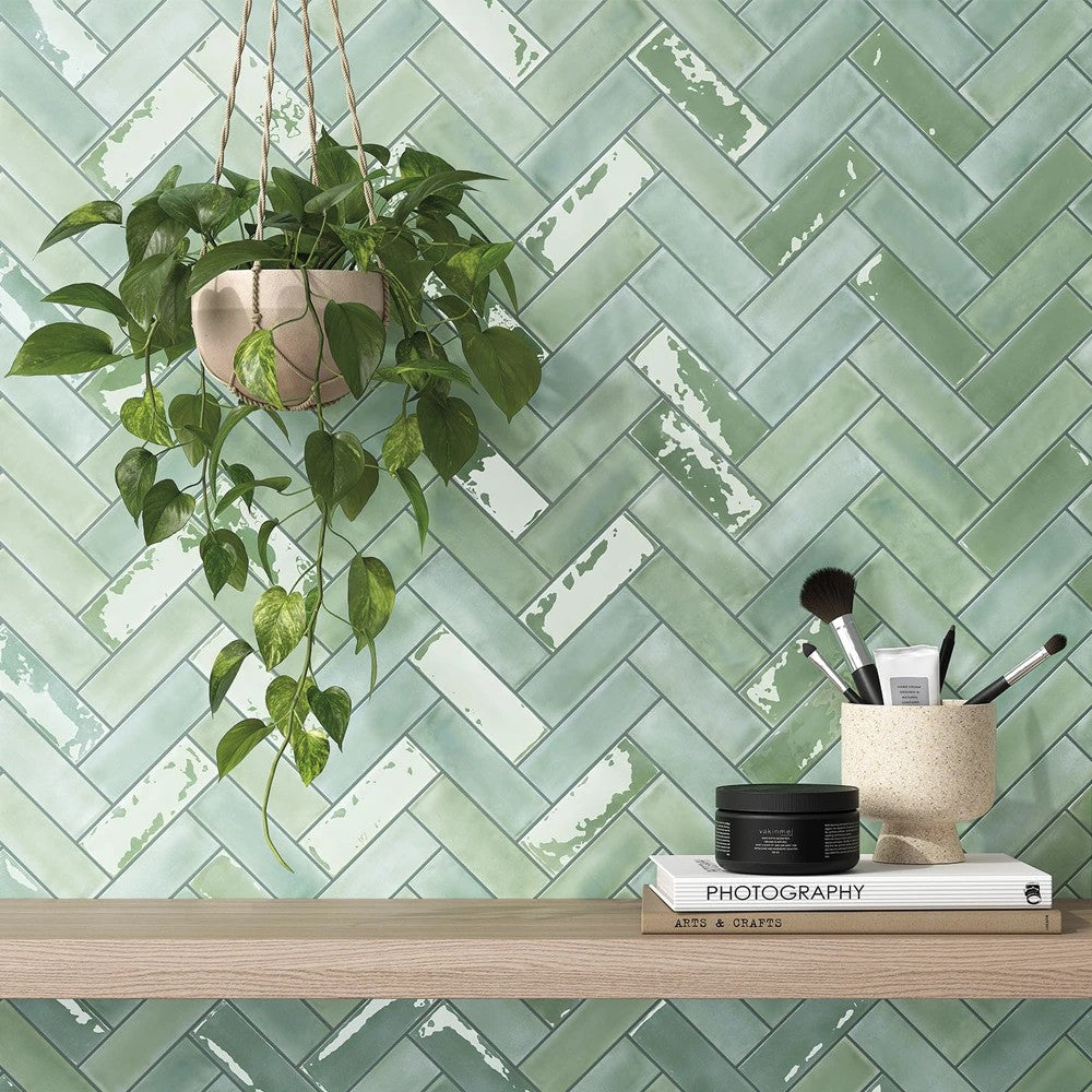 Feature wall tiled with Atelier green gloss and matt brick tiles