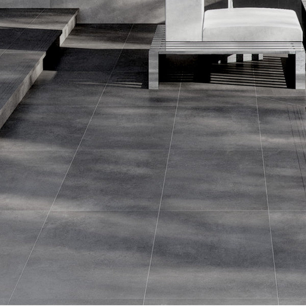 Outdoor space with durable Avada anthracite matt porcelain tiles