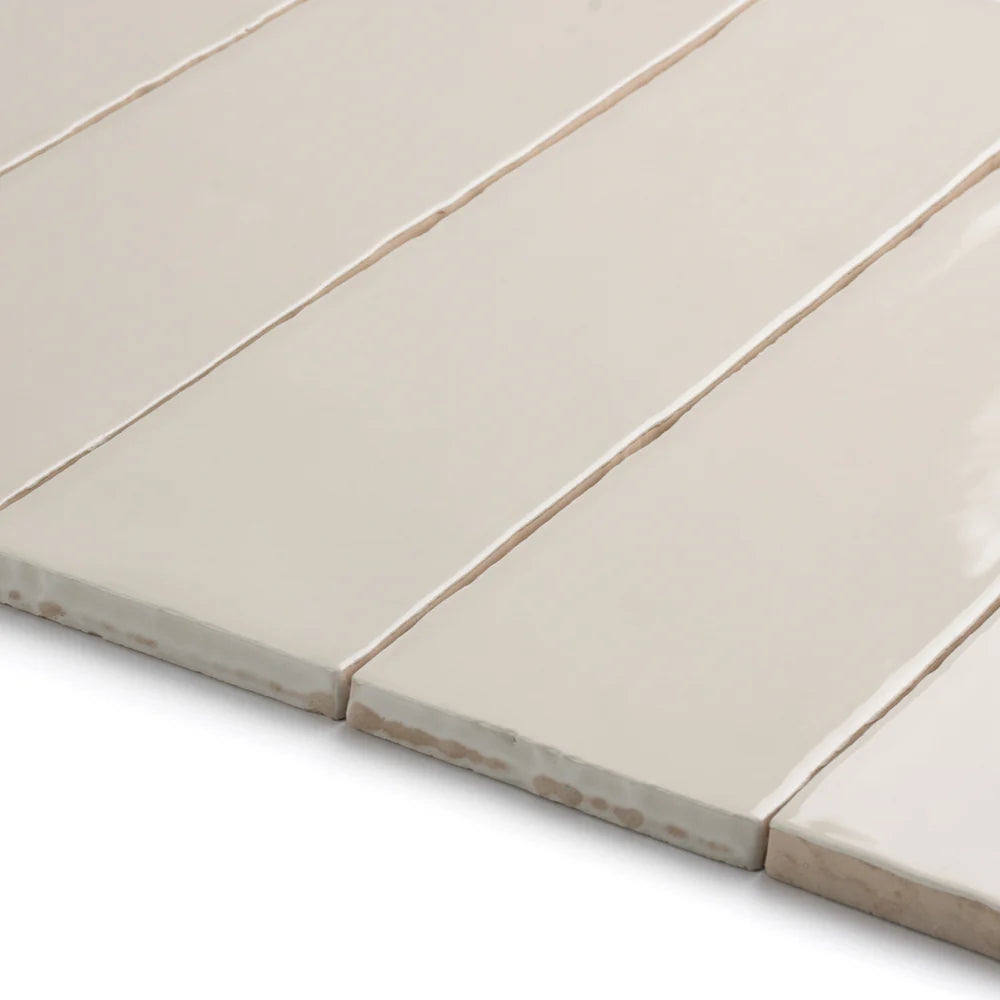 Close-up of Bespoke mushroom rustic ceramic tile laid with earthy tones and uneven edges