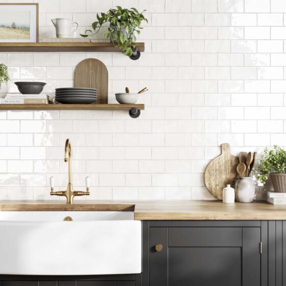 Kitchen splashback tiled with handcrafted ceramic Bespoke white wall tiles 