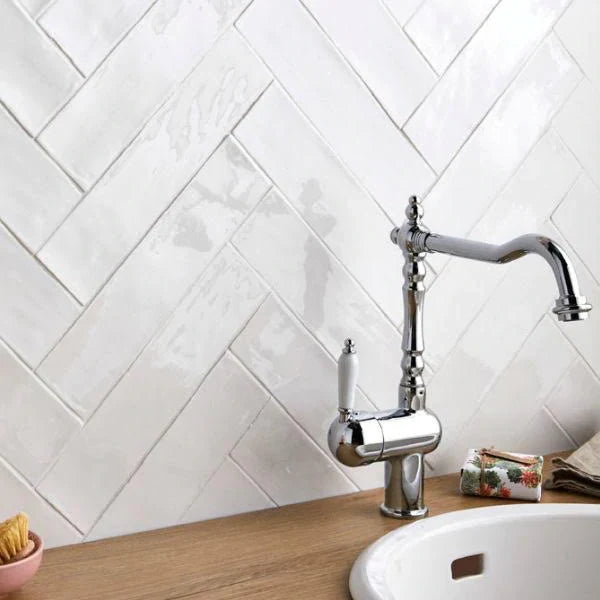 Bathroom tiled with Bespoke white rustic ceramic wall tiles with uneven edges