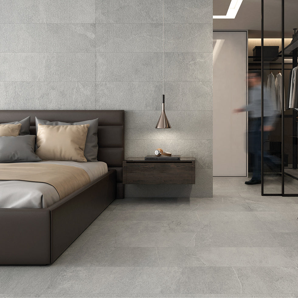 Contemporary bedroom walls and floors tiled with Blend grey floor tile