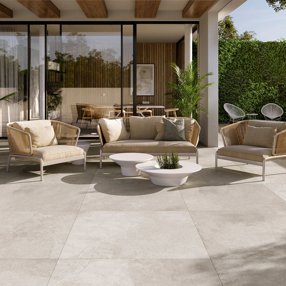 Textured Blend white floor tile used in a luxury outdoor seating area