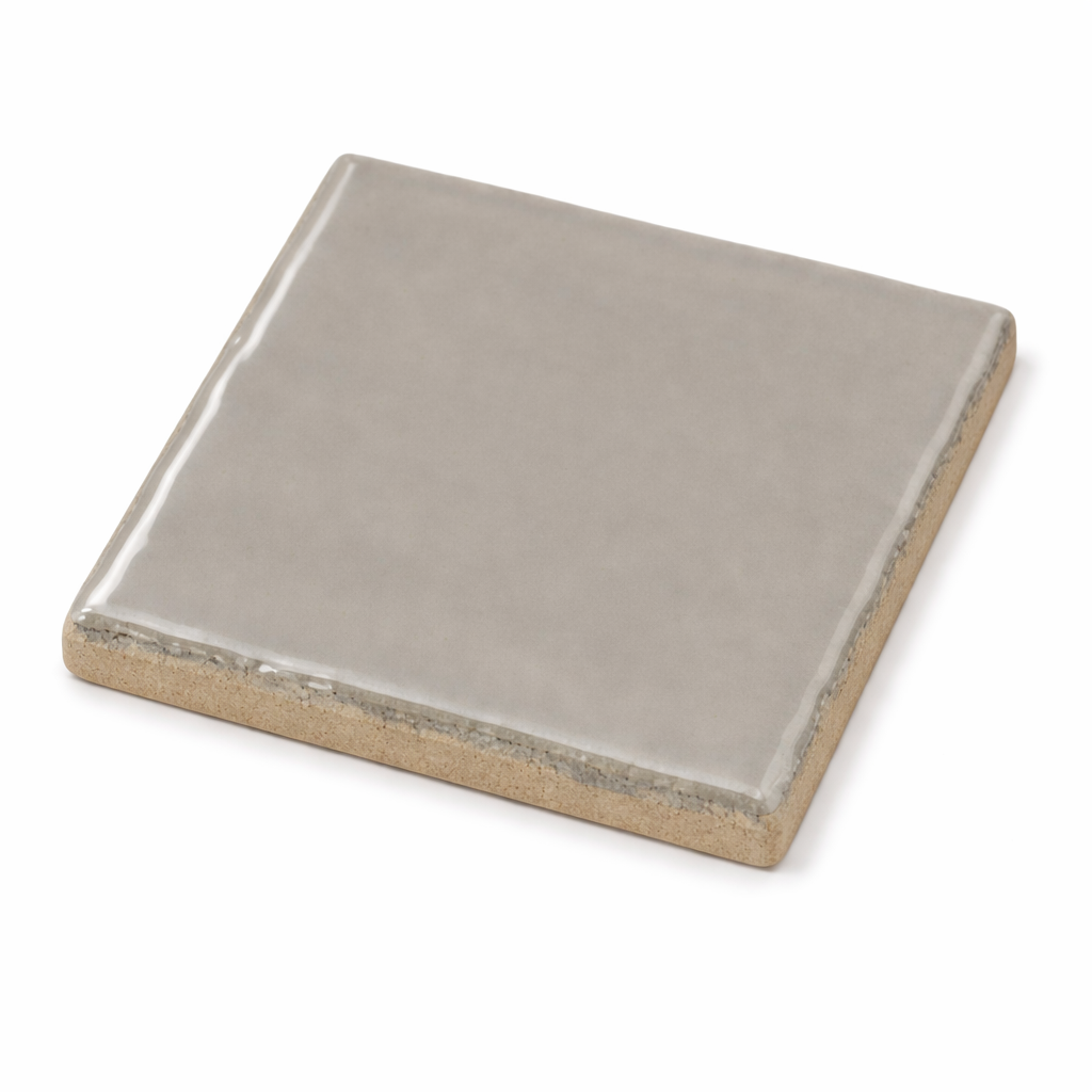 Close up of Bold grey ceramic wall tile with smooth shiny finish for modern interiors