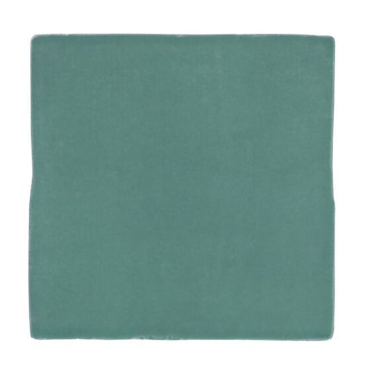 Close up of Bold turquoise gloss ceramic tile for bathroom and kitchen wall applications