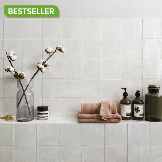Luxury bathroom styled with high-shine Bold white ceramic wall tiles