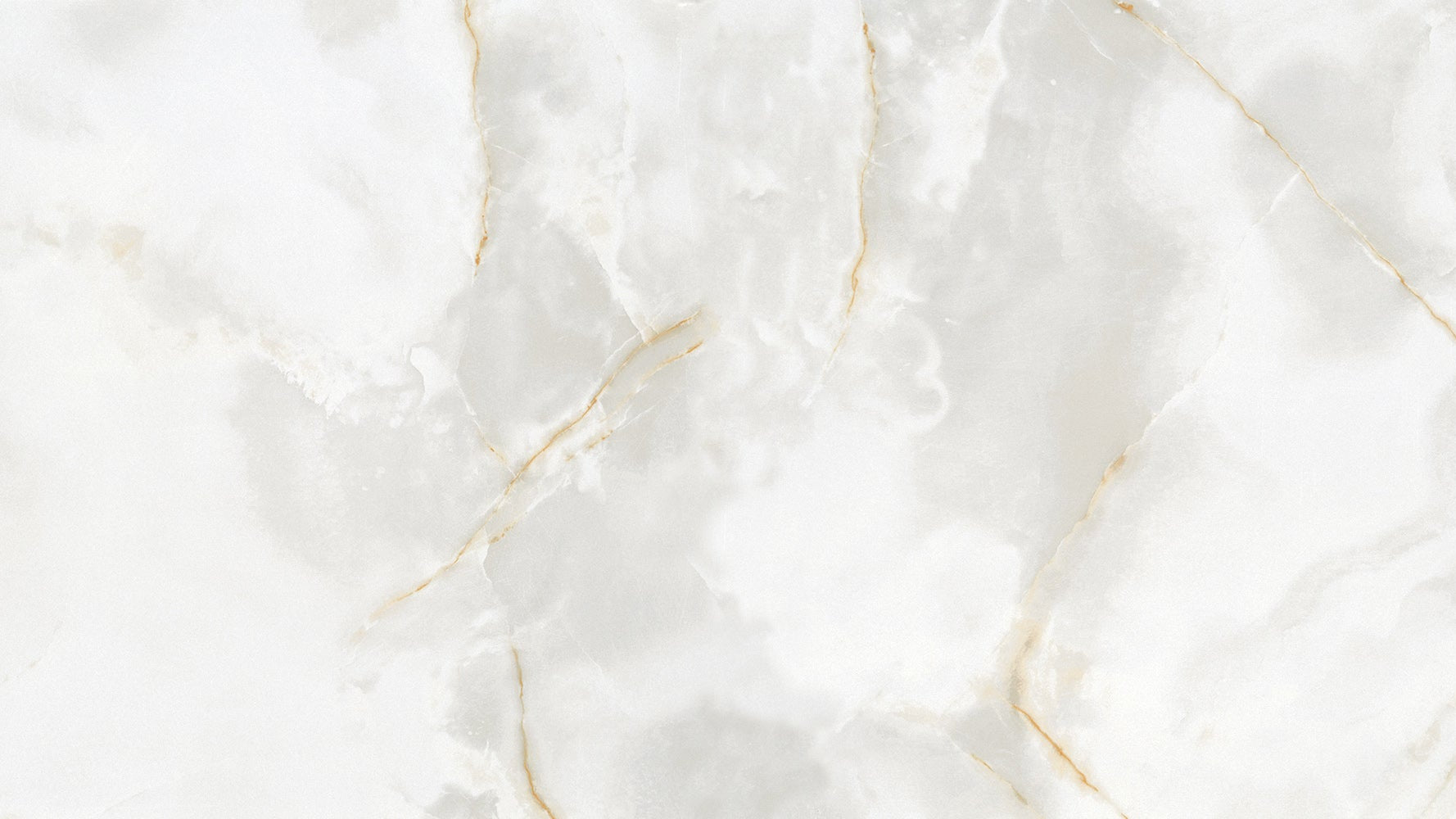 Close up of large format Onyx gold marble tile with polished finish and soft gold veining