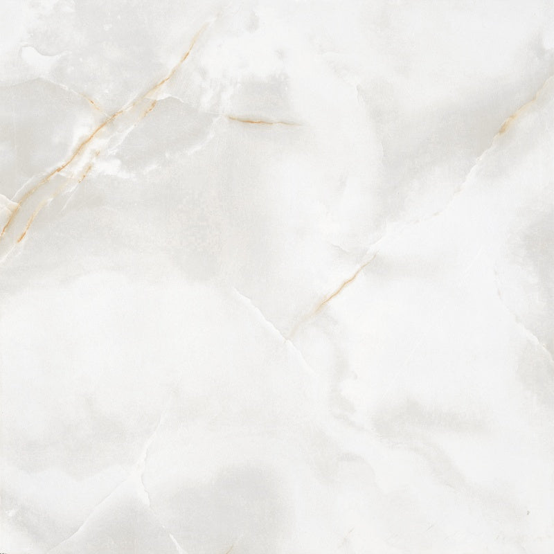 Close up of Onyx gold gloss marble tile with soft gold veining