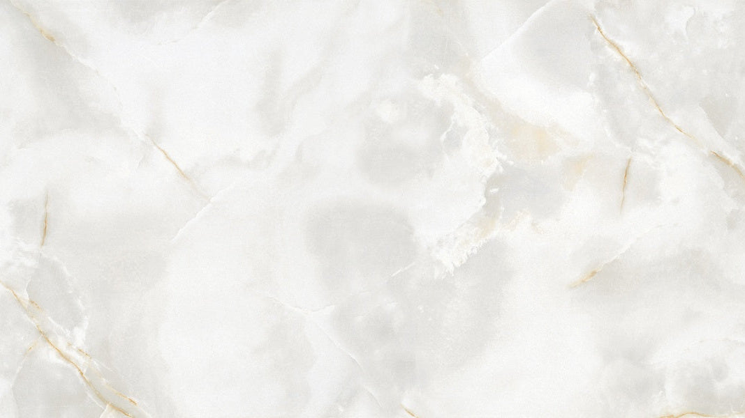 Close up of Onyx gold 60x120 marble tile with polished finish and soft gold veining
