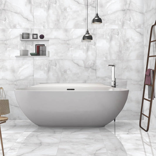 Designer bathroom featuring Onyx ice grey marble tile with polished finish and soft grey veining