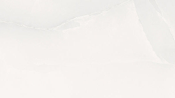 Close up of Onyx ice grey large format marble tile with polished finish and soft grey veining