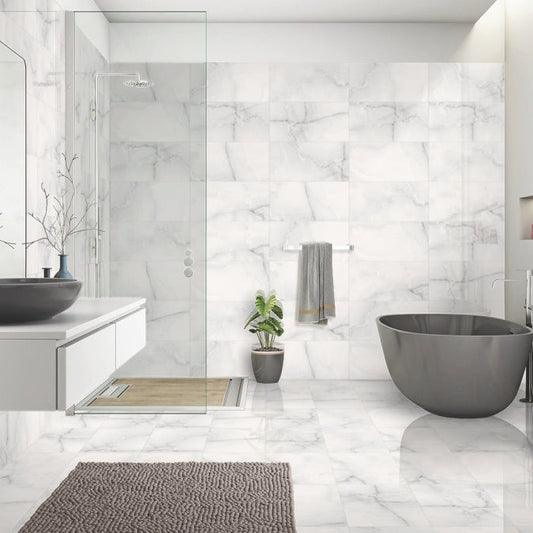 Luxury bathroom featuring Onyx ice grey marble tile with polished finish and soft grey veining