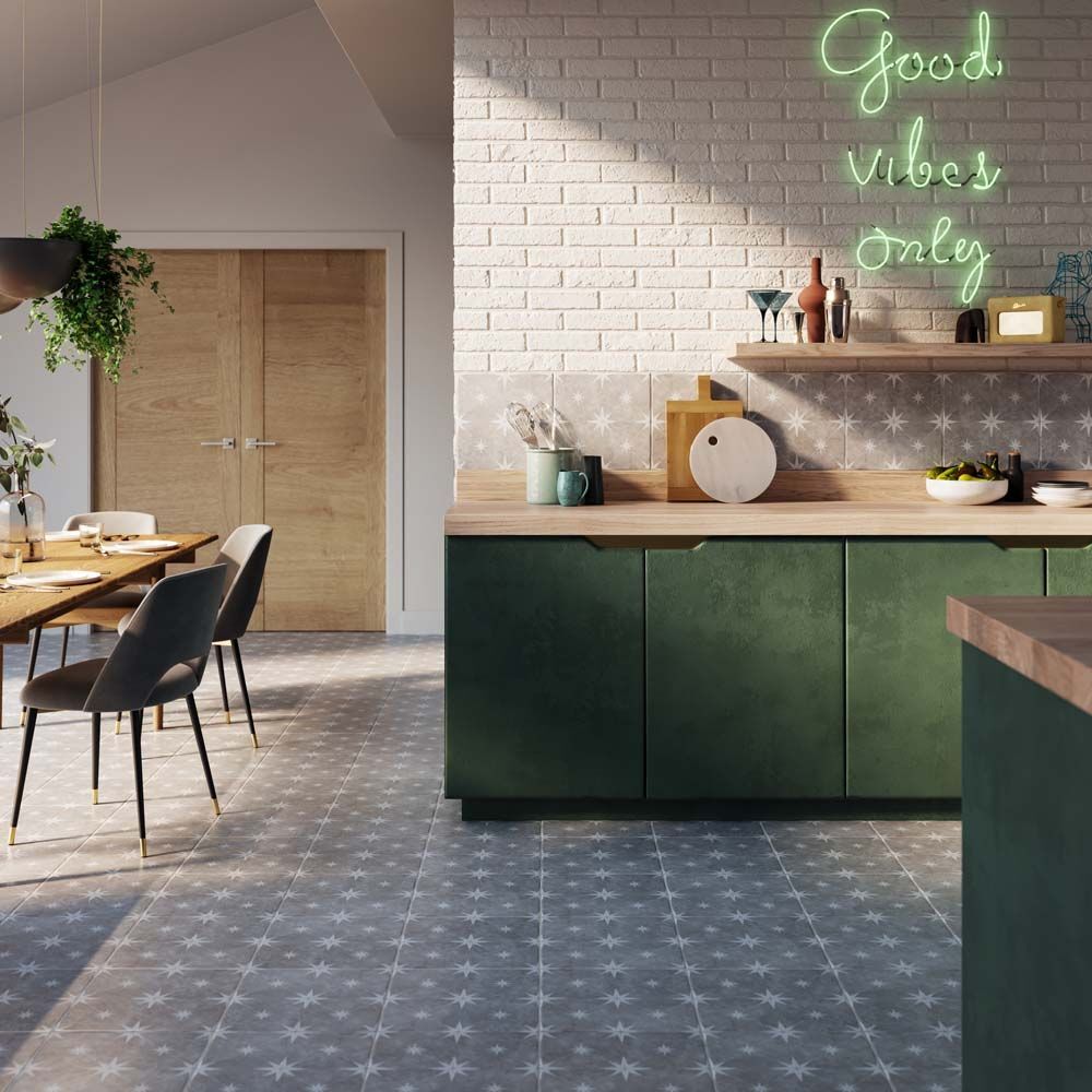 Modern kitchen styled with Orb Grey patterned tile for walls and floors
