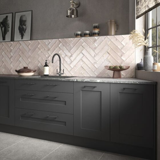 Wish gloss brick wall tile in a modern kitchen with a herringbone backsplash